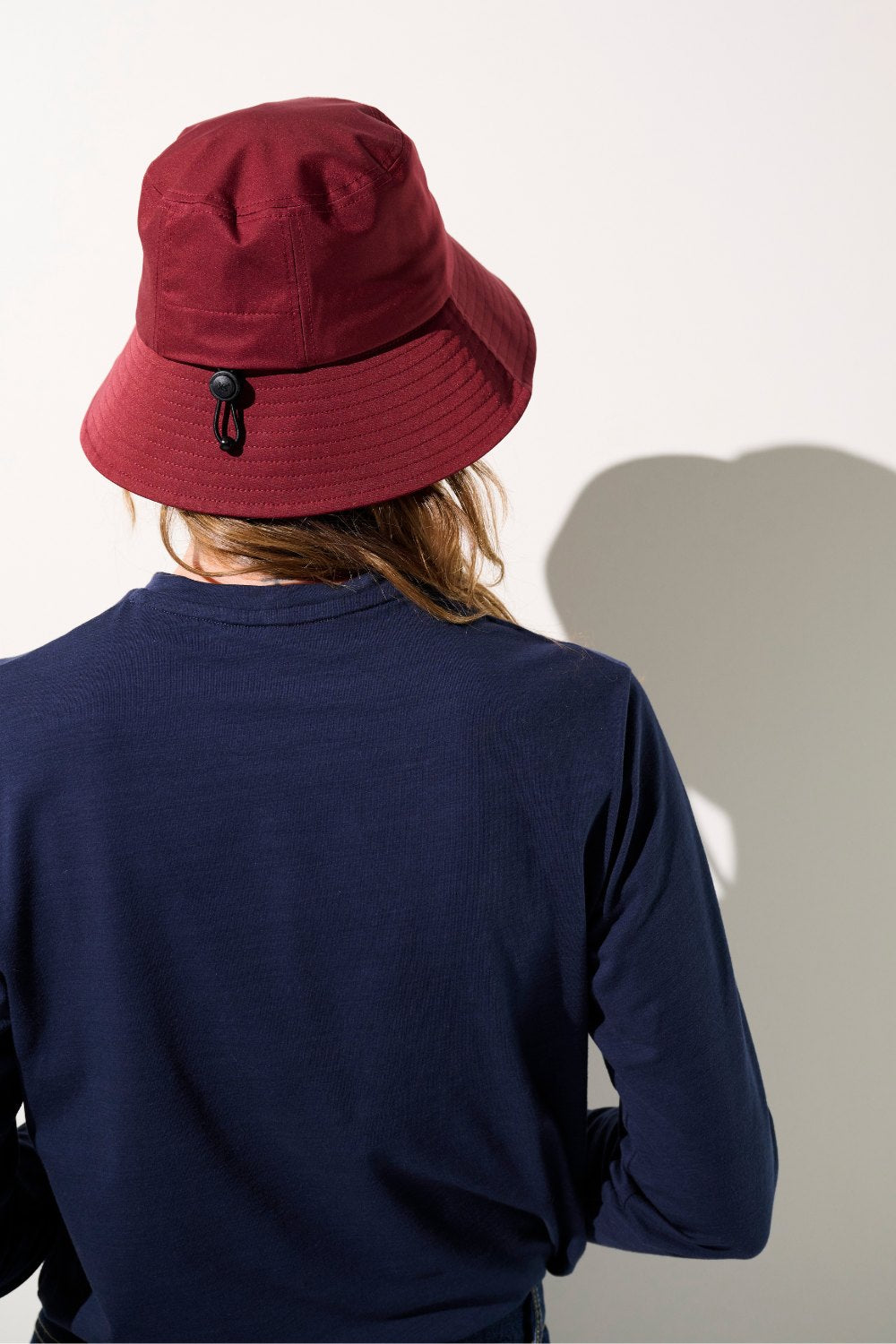 Bob anti-UV - Faro rouge pour femme, léger et pratique, offrant une protection solaire efficace.