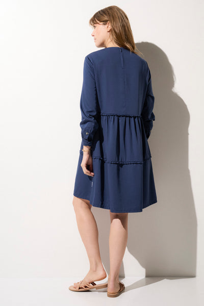 Robe anti-UV bleu marine pour femme, légère et élégante, offrant protection solaire UPF50+ pour les journées ensoleillées.