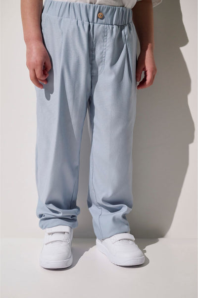 Pantalon anti-UV - Faro bleu clair pour enfant, léger et confortable, parfait pour jouer au soleil avec protection UPF 50+.